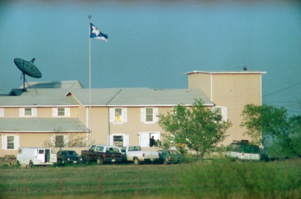 Two Houston attorneys leave the Branch Davidian compound after a meeting with David Koresh, during the seige