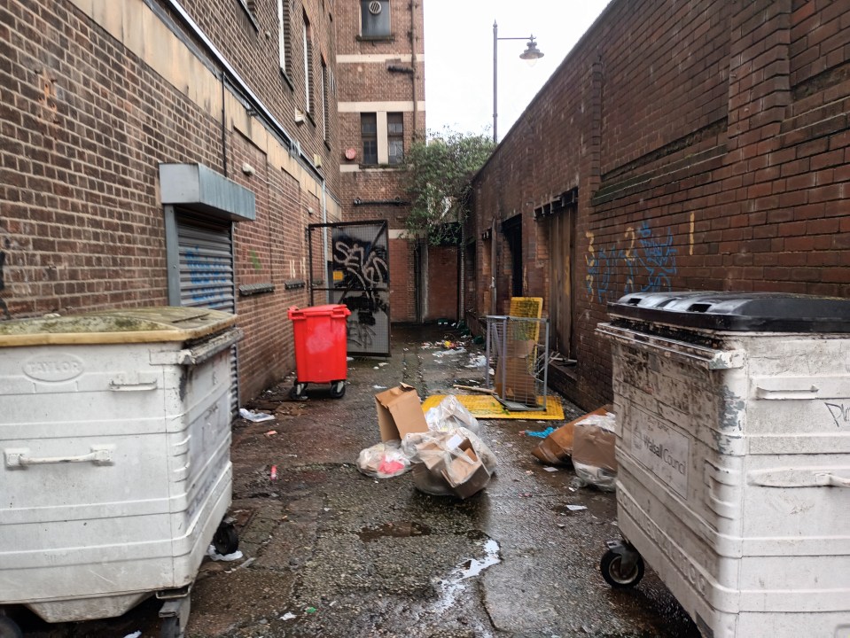 One heavily littered alleyway near Walsall bus station