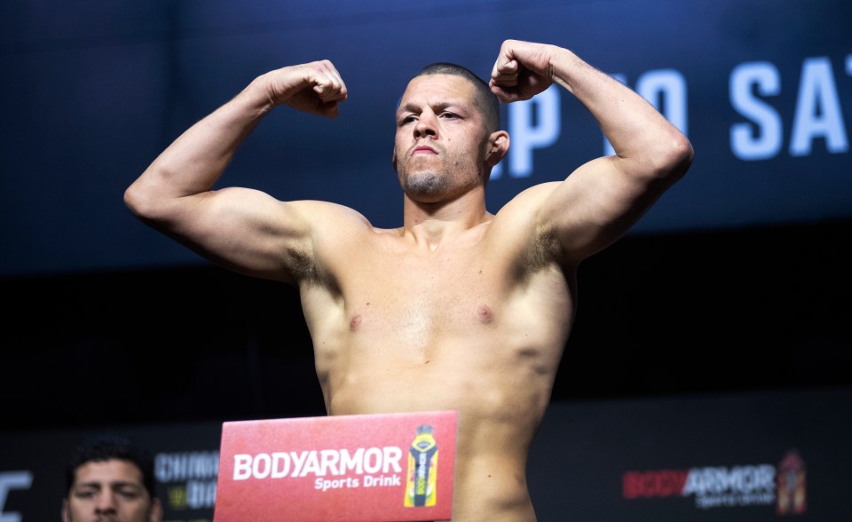 Nate Diaz handed himself into police after a warrant for his arrest was issued on Monday