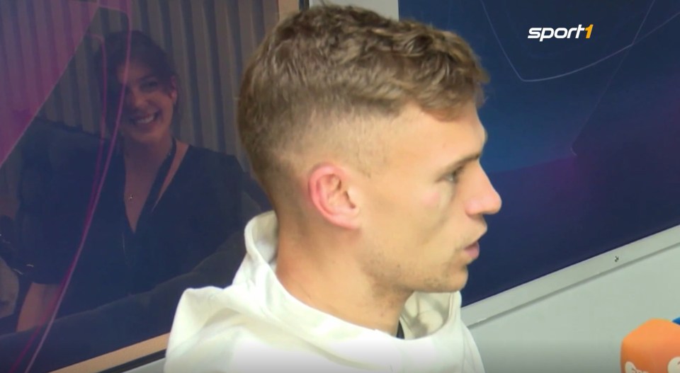 A woman spectacularly gatecrashed Joshua Kimmich's interview by shaking her boobs