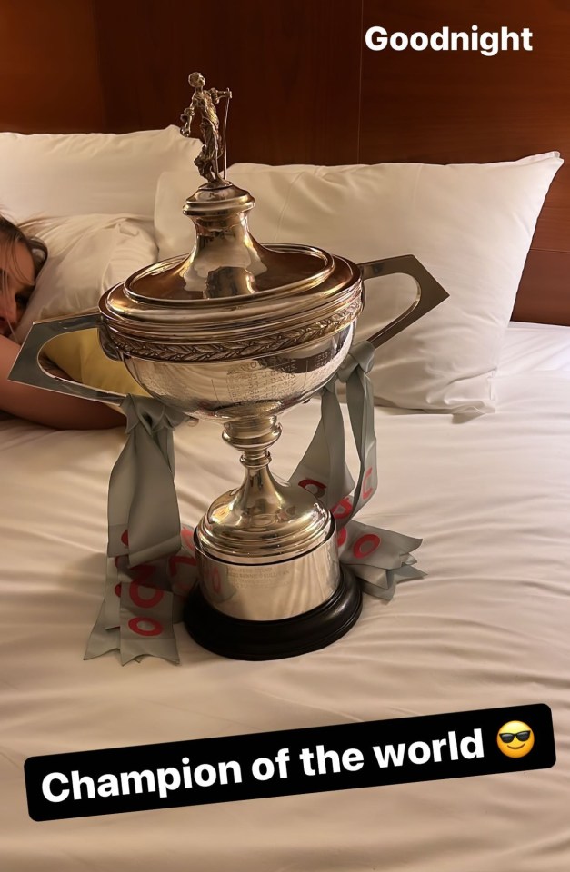 Brecel shared a picture of the world championship trophy on his bed after his triumph