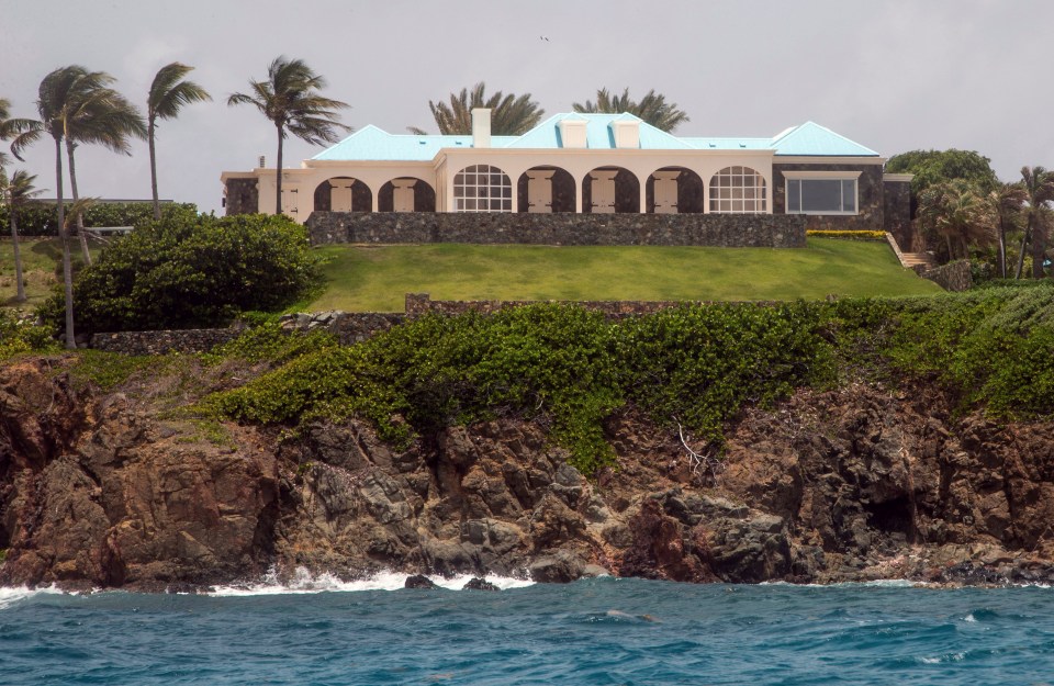 The island features a main villa fit with a helicopter pad