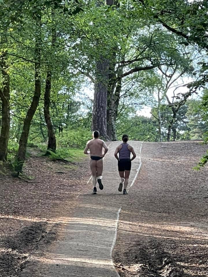 The nude runner was spotted dashing through National Trust-owned woodland in Alderley Edge