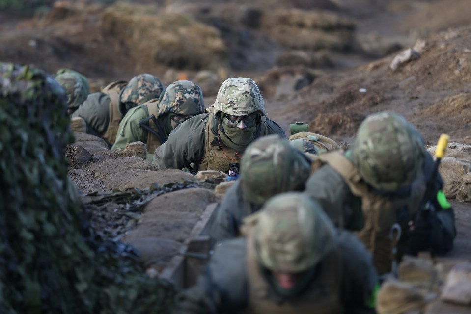 Ukrainian soldiers trawl through trenches to hold off Vlad's army