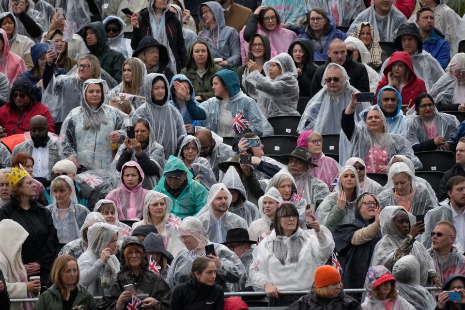 Many royal fans kept themselves dry as the big day unfurled