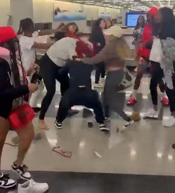 The huge fight took place inside Chicago O'Hare International Airport