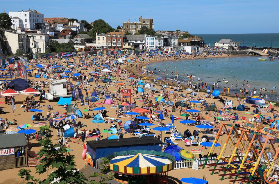 The beach's popularity sees its golden sands are covered with a sea of colourful towels in summer