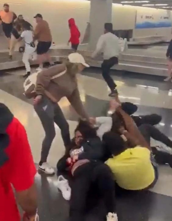 One woman was spotted yanking another woman's hair while she was on the floor