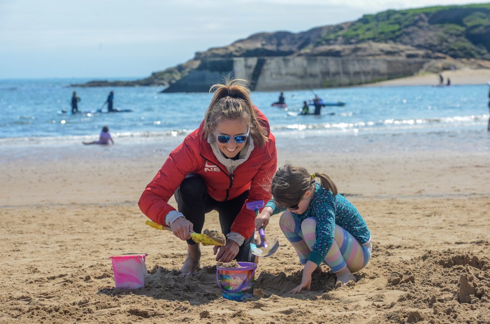 Sarah Penny and her neice Libby Mason, 5, had fun building sandcastles at Cullercoats Beach in North Tyneside last Saturday