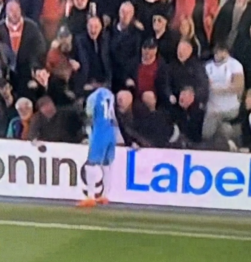 Amad Diallo tried to get the ball back from the Luton fans