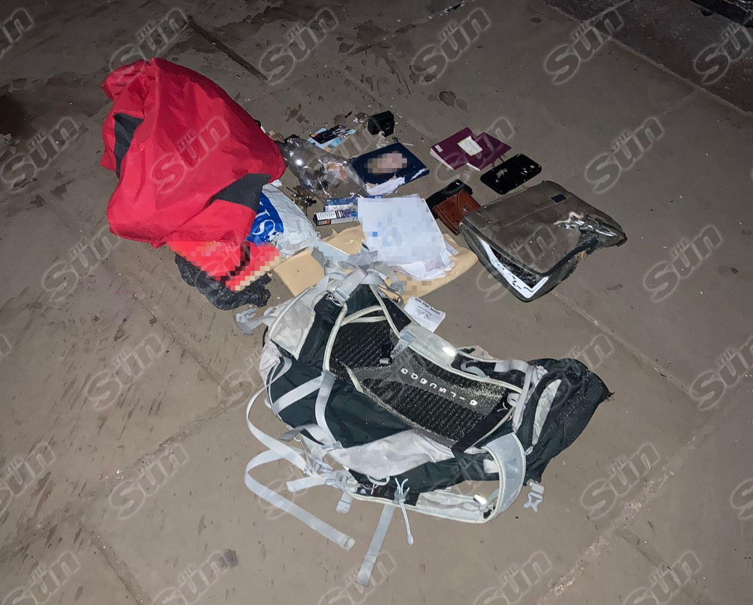 His rucksack was laid on the floor and the contents removed