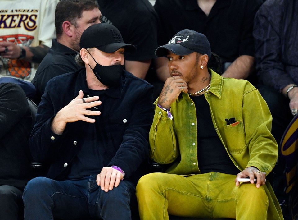 DiCaprio and Hamilton chatted during the game in Los Angeles