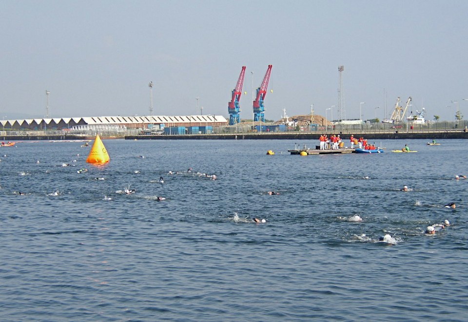 A swimmer has died during the Swansea Triathlon