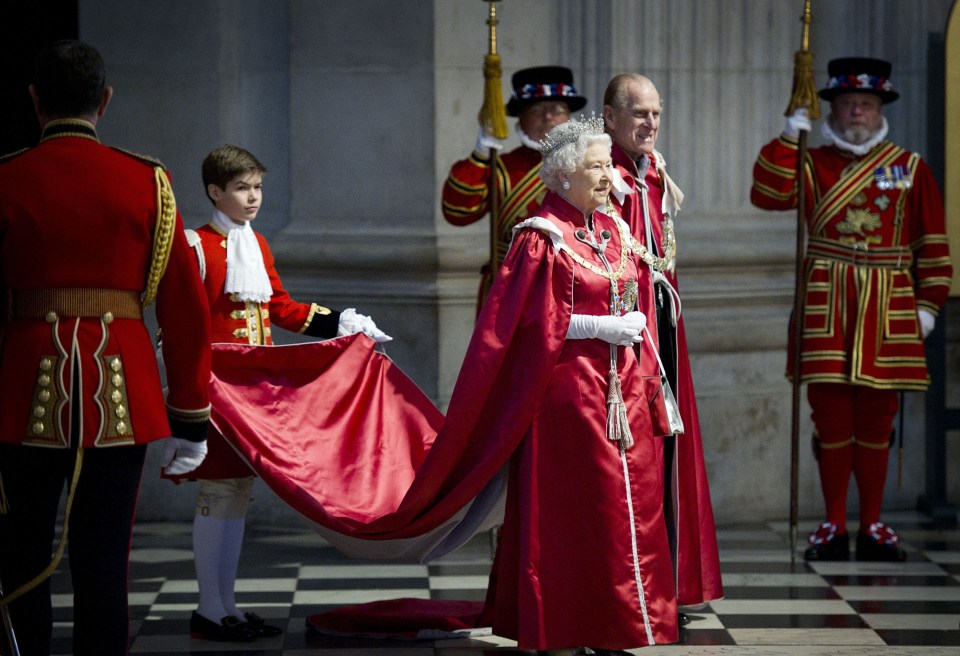 Arthur was the Queen's Page of Honour in 2012 and carried her gown