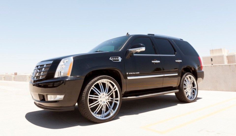 Scottsdale, United States - June 9, 2011: A photo of a black parked Cadillac Escalade, the Escalade from Cadillac is their most popular SUV.