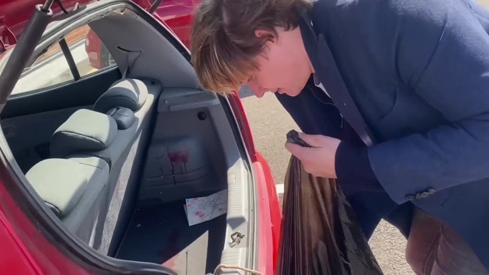 PIC FROM Kennedy News/Josh & Archie (PICTURED: ARCHIE MANNERS REMOVING 'CRIME SCENE EVIDENCE' FROM THE CAR) Pranksters keen to test if We Buy Any Car live up to their name were left stunned when they pretended to be gangsters and turned their hatchback into a 'crime scene' - yet the motor firm still bought it. Josh Pieters and Archie Manners, both 29, smeared fake blood over a Kia Picanto and filled the boot with rope, cable ties and even Archie's real hair. A viral video shows the visibly nervous pair parking their vehicle at We Buy Any Car's Putney branch, South London, and telling the worker they 'need to get rid of it quickly'. DISCLAIMER: While Kennedy News and Media uses its best endeavours to establish the copyright and authenticity of all pictures supplied, it accepts no liability for any damage, loss or legal action caused by the use of images supplied and the publication of images is solely at your discretion. SEE KENNEDY NEWS COPY - 0161 697 4266