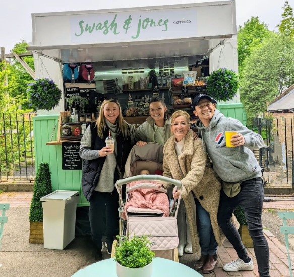 Shana with her family, including brother Joe, at her coffee shop trailer