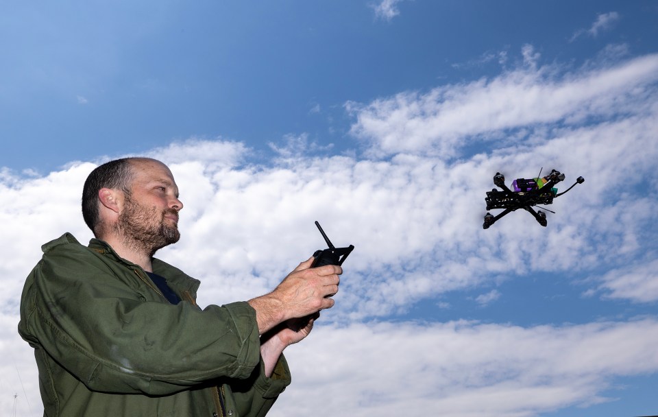 ¿ Picture by Peter Jordan Story by Jerome Starkey Homemade drones made by an unidentified person in Ukraine which are used as either suicide drones able to carry a Rocket Propelled Grenade (RPG) or intelligence gathering. Also larger drones that are able to carry several larger mortar rounds in one flight. Picture shows Sun reporter Jerome Starkey flying a homemade drones Today Monday 22nd May 2023 The Sun Picture by Peter Jordan