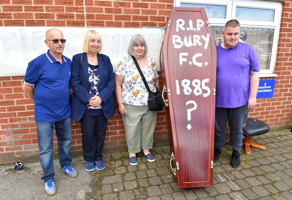 File photo dated 23-08-2019 of Bury fans deliver a symbolic coffin reading 'R.I.P Bury F.C. 1885 ?' at Gigg Lane, home of Bury FC. PA Photo. Issue date: Thursday December 12, 2019. Just four months after celebrating promotion to League One, Bury were expelled by the English Football League after failing to find a buyer to rescue it from its financial difficulties. In doing so, the Shakers became the first club to drop out of the Football League since Maidstone United were liquidated in 1992. See PA story SPORT Christmas Best and Worst.Photo credit should read Dave Howarth/PA Wire.