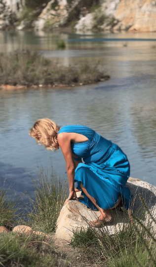 She had to awkwardly stumble off the rock