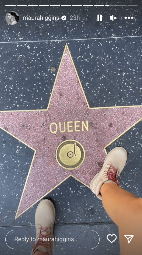 Maura's foot can be seen in one photo standing on the Hollywood Walk of Fame star for the renowned rock band Queen