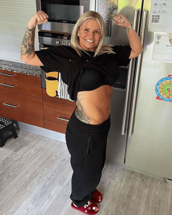 Kerry Katona showed off her flat tummy after training hard