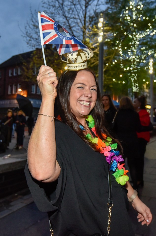 This woman got into the coronation party spirit with a crown, waving a Union flag while out and about in Newcastle