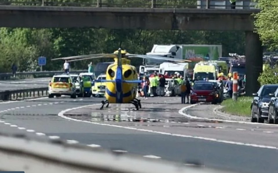 An air ambulance at the scene of the crash on the M66