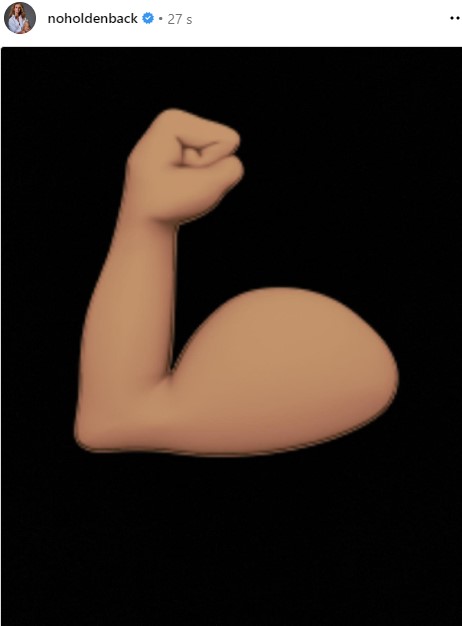 The mum of two posted a strongman arm Emoji in an apparent celebration