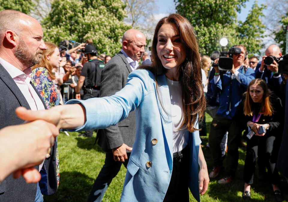 Kate charmed crowds as she shook hands in Windsor today