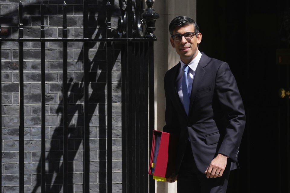 Rishi Sunak was pictured leaving No10 for PMQs in the Commons this morning