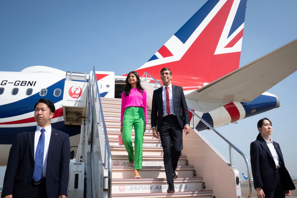 British Prime Minister Rishi Sunak, center right, and his wife Akshata Murty arrive in Japan for the G7 summit