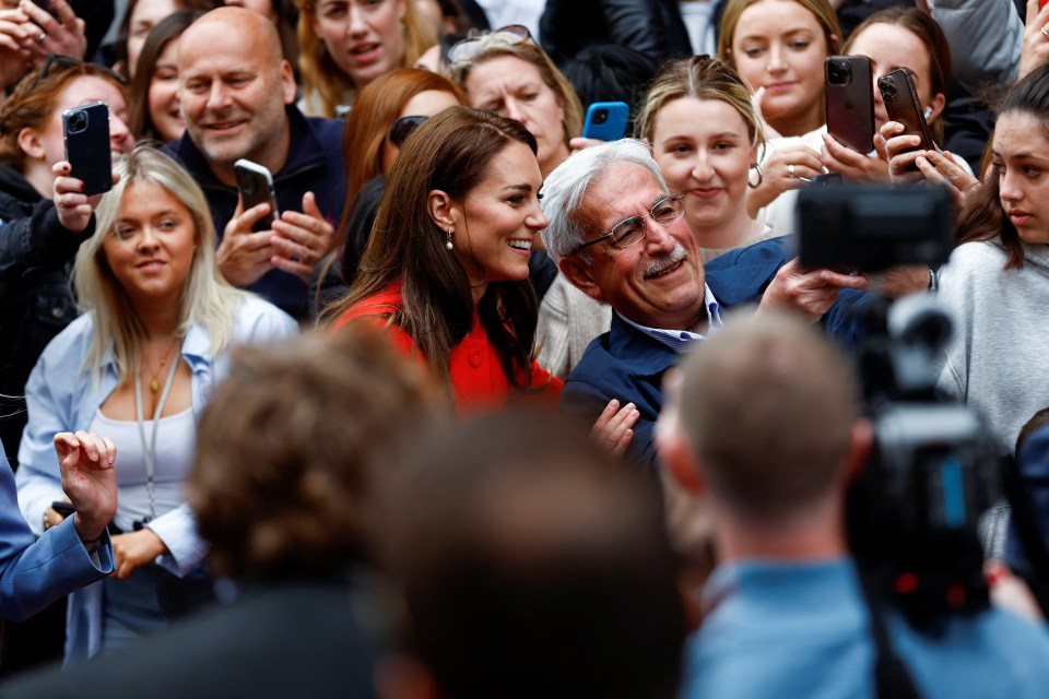 Kate posed with fans and took photographs as they walked around Soho