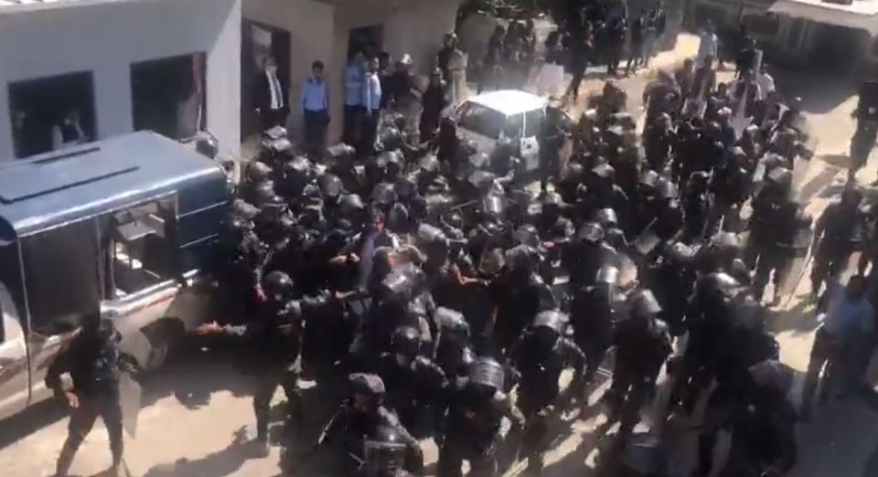 Footage shows a huge number of police officers surrounding the former Pakistan PM