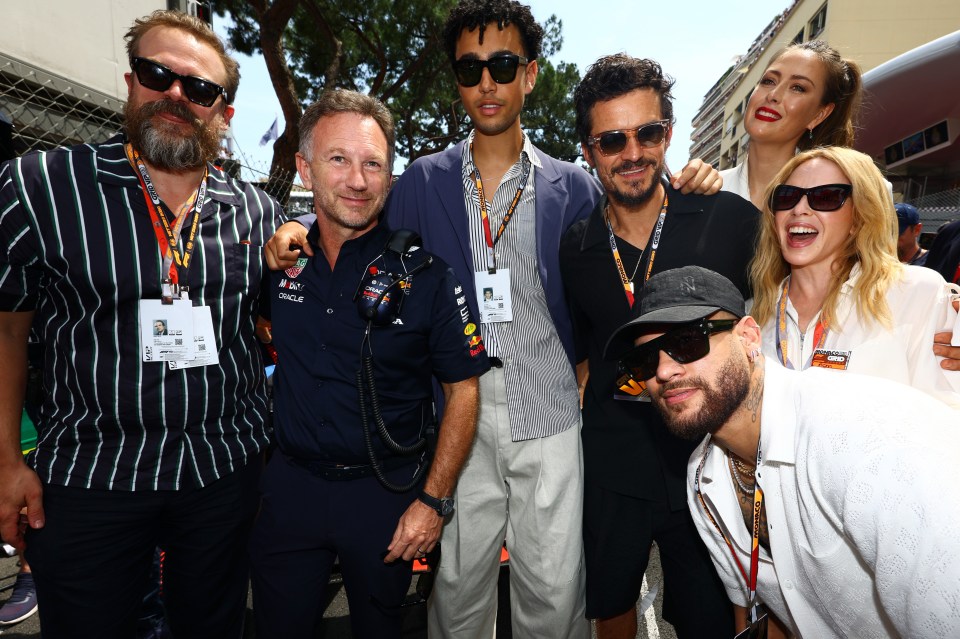 From L-R, David Harbour, Christian Horner, Archie Madekwe, Orlando Bloom, Neymar, Maria Sharapova and Kylie Minogue pose for a photo