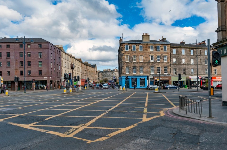 Edinburgh, Scotland - April 2018: Early 19th century Victorian tenement flats and historic buildings on Tollcross, a major road junction to the south west of the city centre of Edinburgh in Scotland, UK