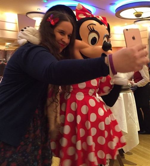 Megan takes a selfie with a Disney character during a jaunt to Florida