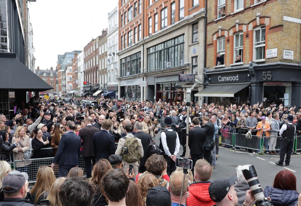 Large crowds have gathered outside the pub to catch a glimpse of the Prince and Princess