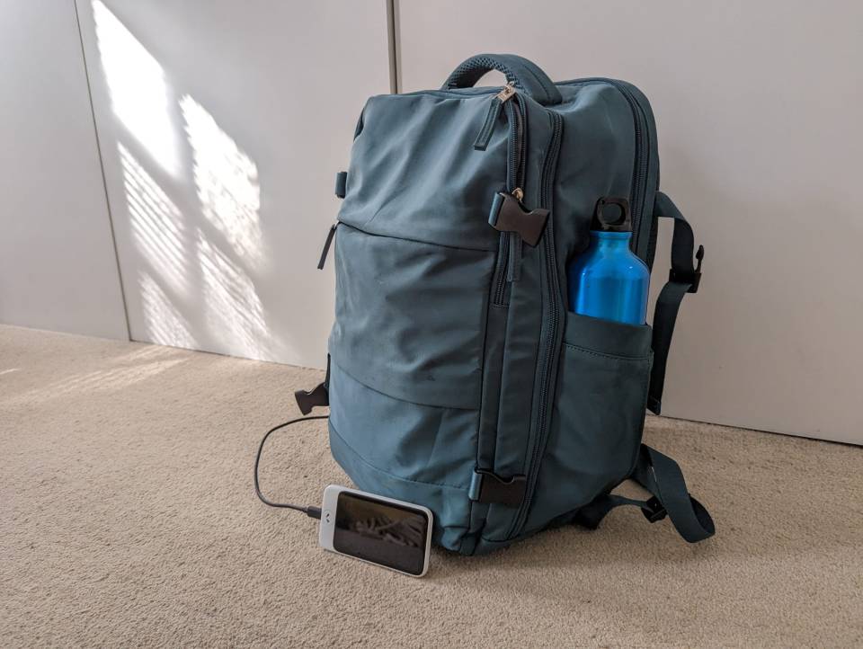 I also packed my water bottle and made use of bag's external USB charger port