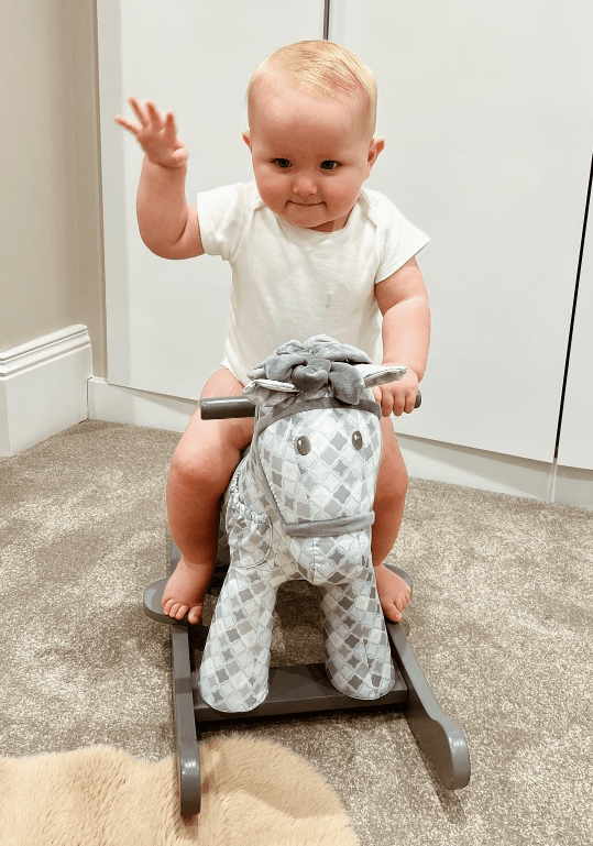 The cameras have followed Brody as he grows up - pictured here on a Little Bird Told Me rocking horse