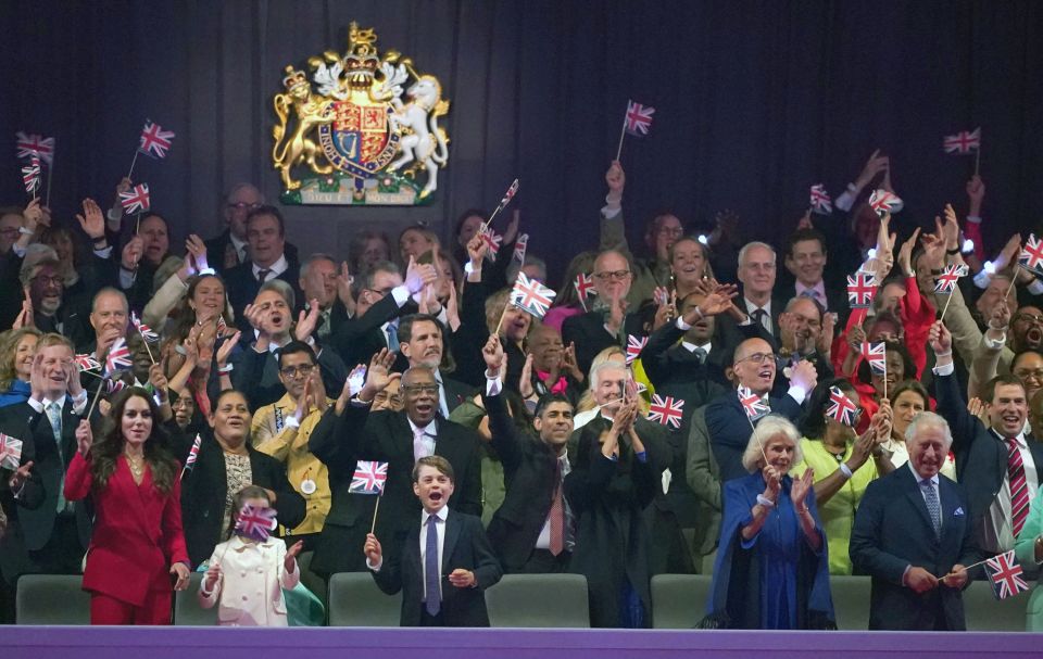 The Royals all waved their flags as the concert came to a close