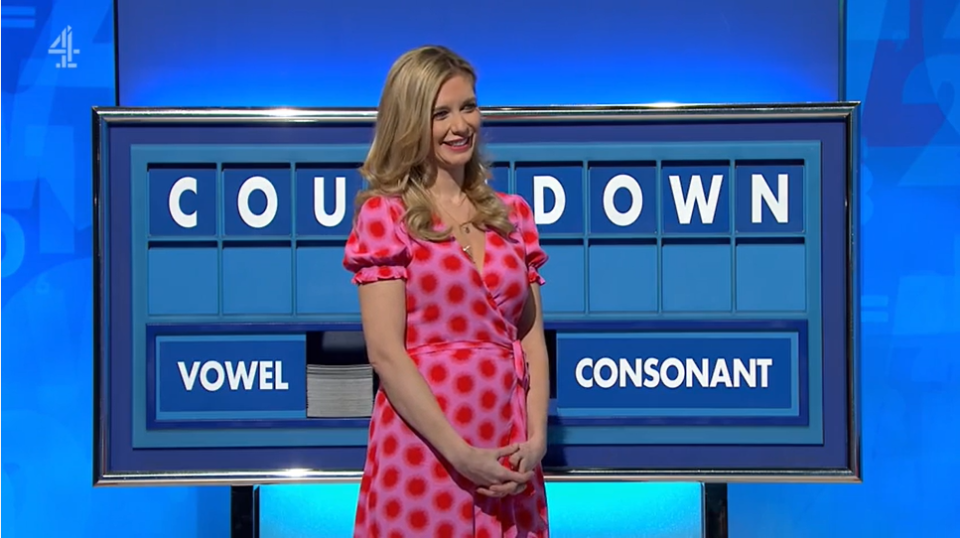 Rachel wore an eye-catching low cut dress which came in a bright pink colour with large red spots on it