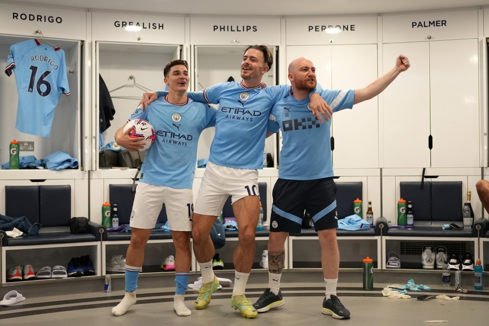 Jack Grealish leads the chorus line, with Julian Alvarez getting on on the act as Man City celebrated winning the Premier League