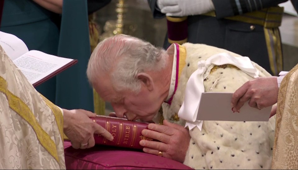 Charles was presented with the new Coronation Bible which he kissed before taking the Oath