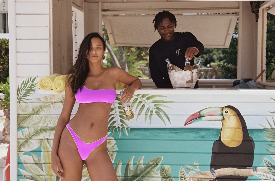 Lais, who stays in shape by boxing, also posed in a pink bikini