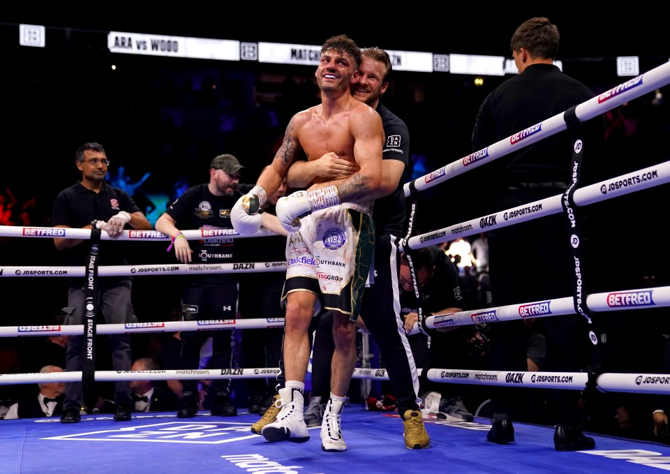 Leigh Wood celebrates with coach Ben Davison