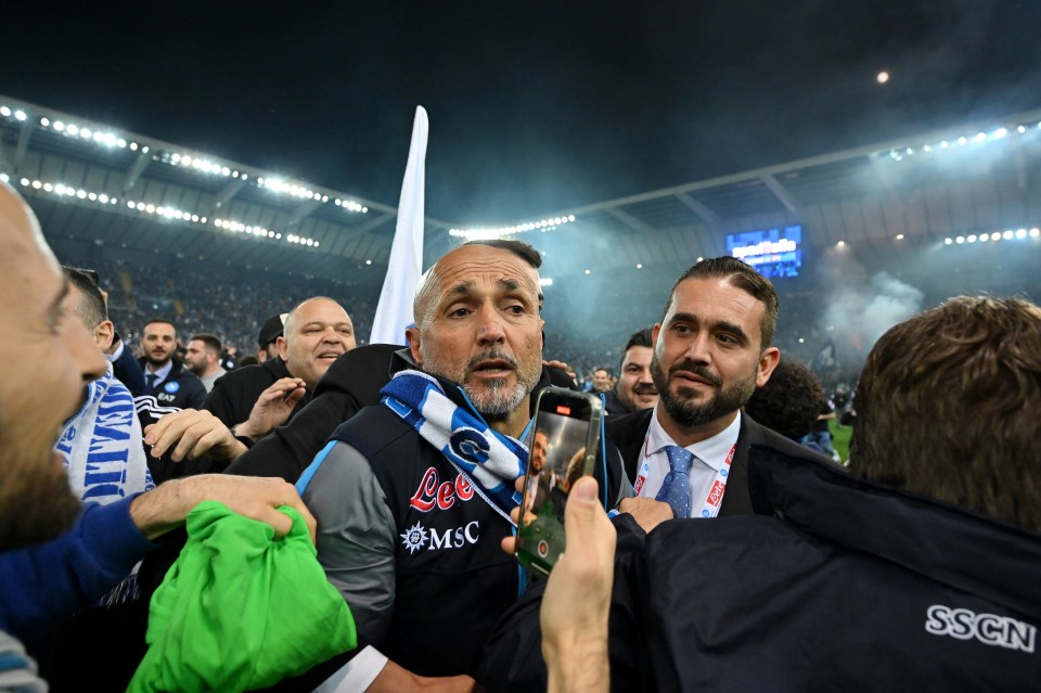 Manager Spalletti was mobbed on the pitch