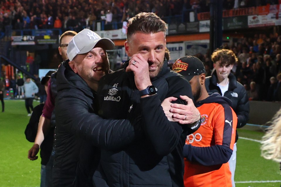 Luton Town manager Rob Edwards is mbbed by fans