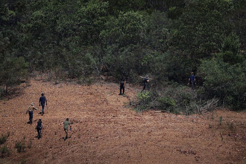 Police were spotted removing what appeared to be large brown evidence bags from the search site