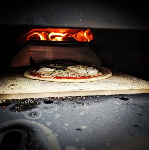 He shared a photo of his pizza oven, suggesting that he would like to open a pizza restaurant